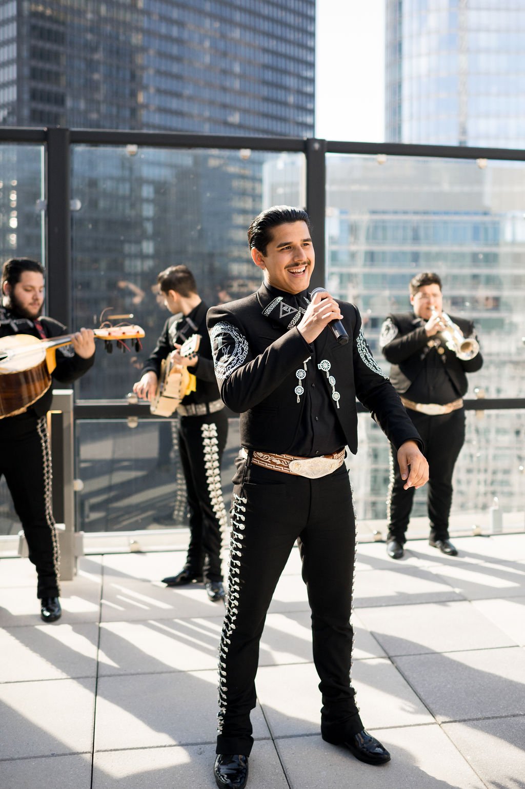 Rooftop wedding celebration with live music
