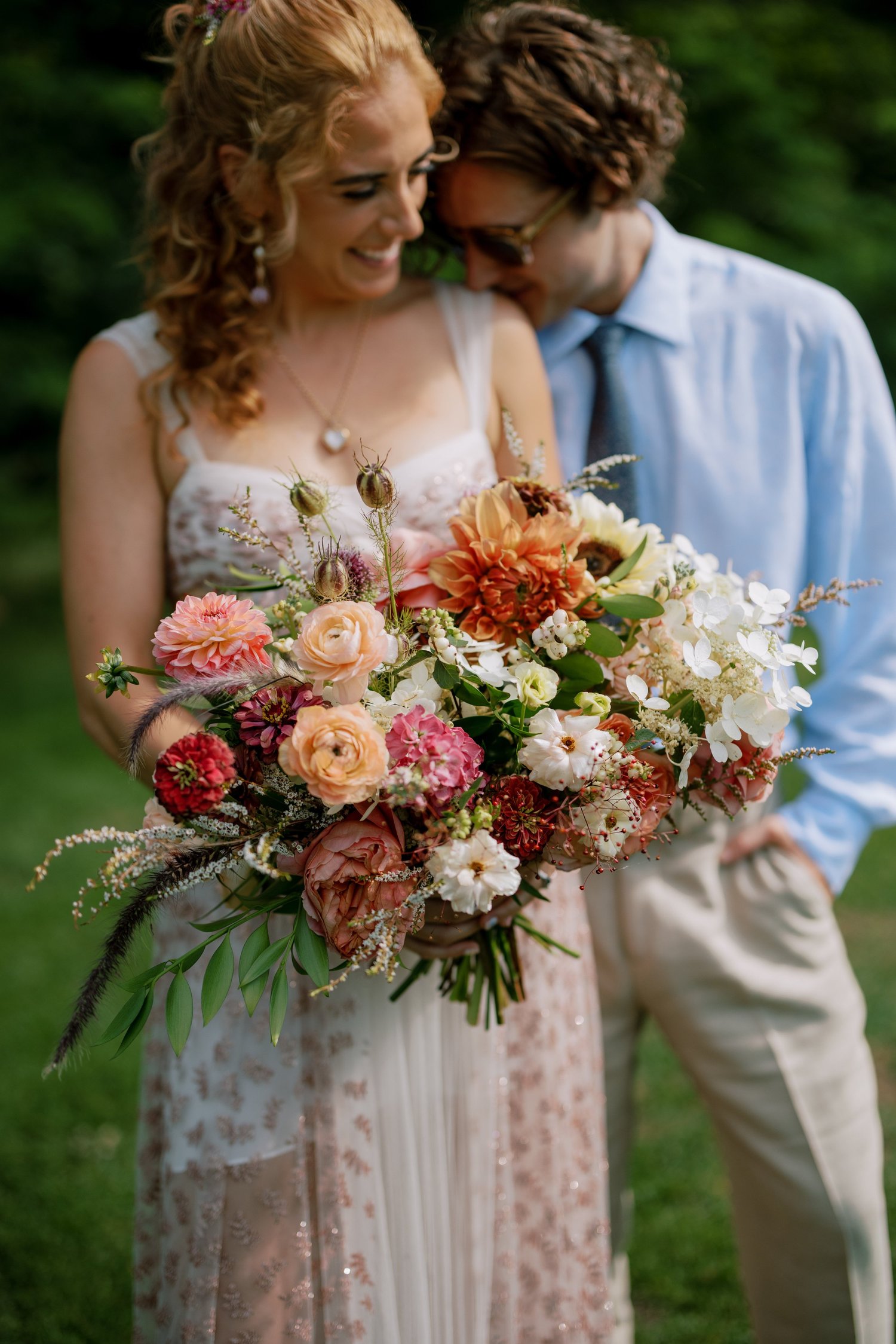 Bride with an autumnal garden-gathered bouquet